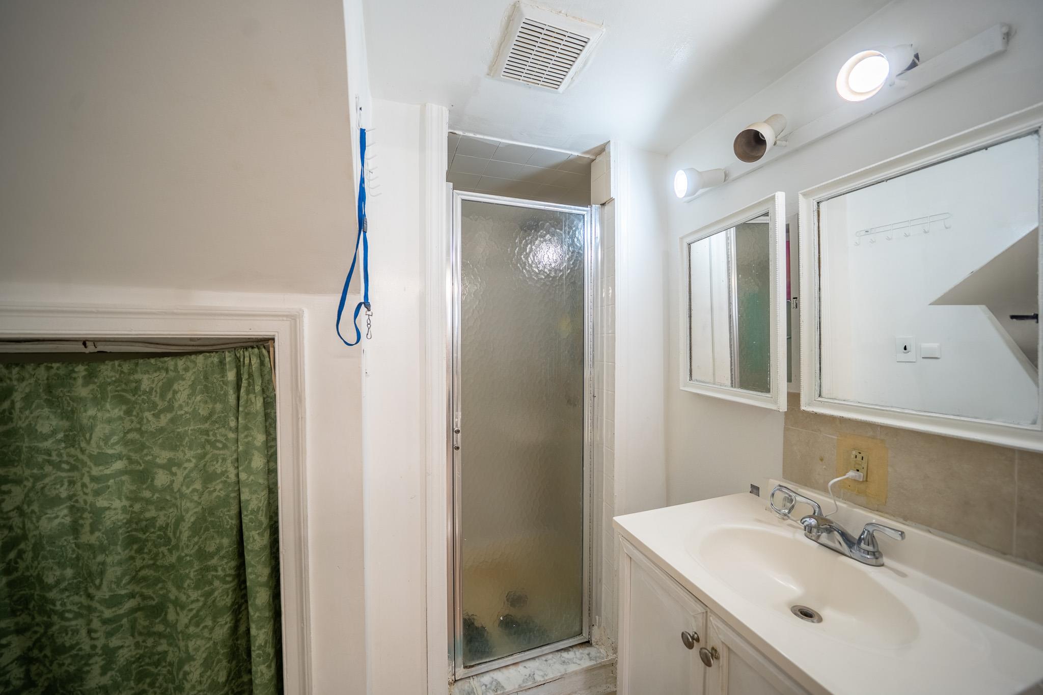 47 Cardinal Road Levittown, NY 11756 - Photo 17 of 27 Full bath featuring a stall shower and vanity
