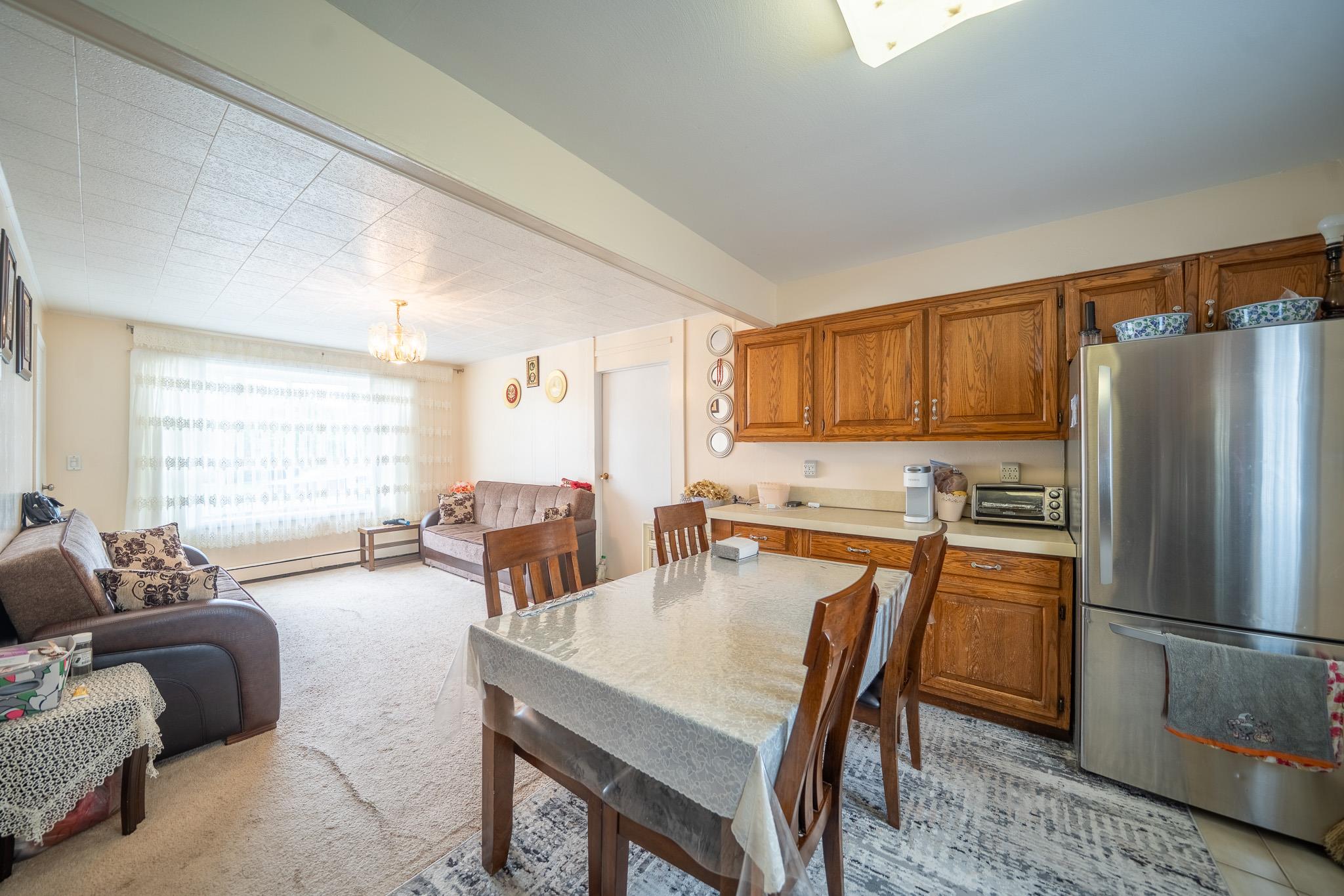 47 Cardinal Road Levittown, NY 11756 - Photo 9 of 27 Dining room with a chandelier