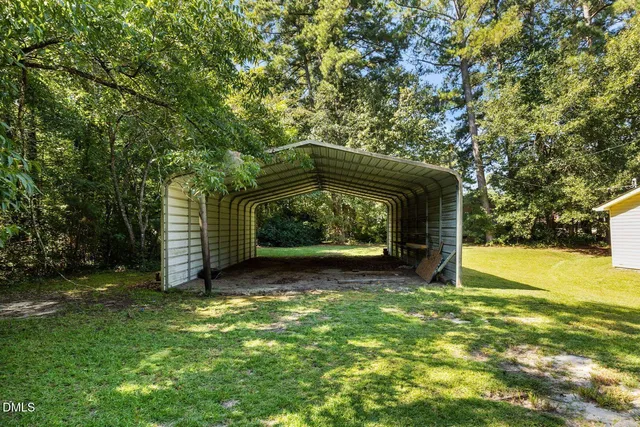 a view of a yard with an outdoor space