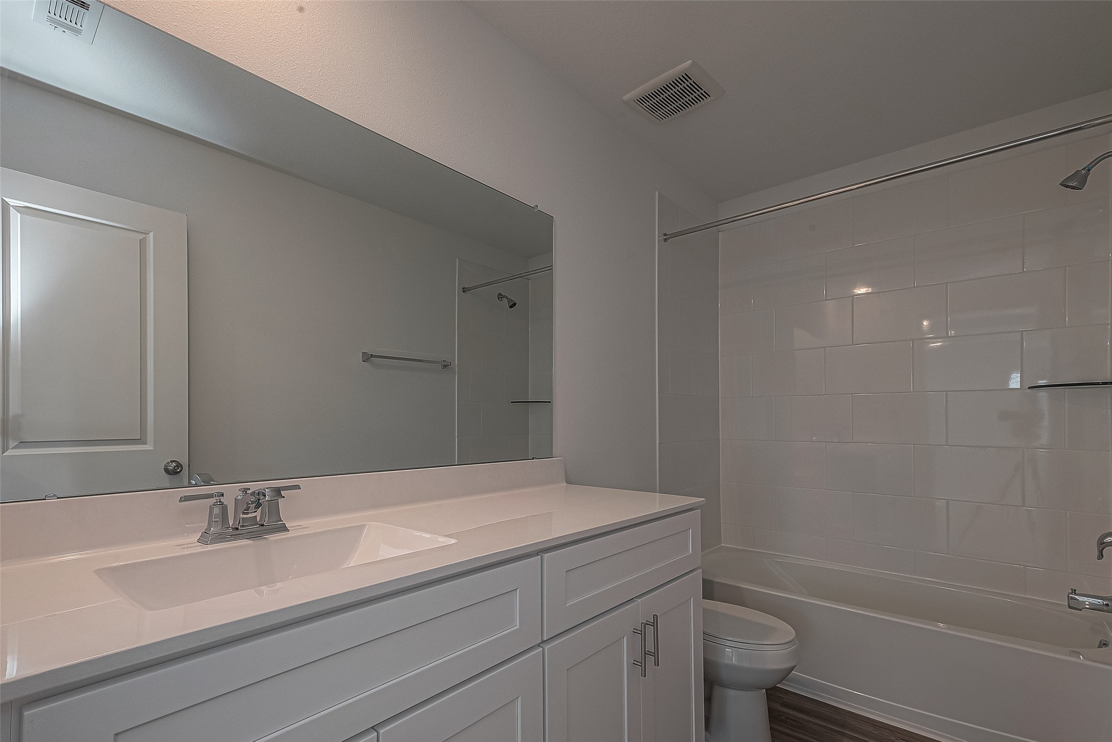 325 Maple Bark Trail Willis, TX 77378 - Photo 20 of 22 a bathroom with a granite countertop sink toilet and shower