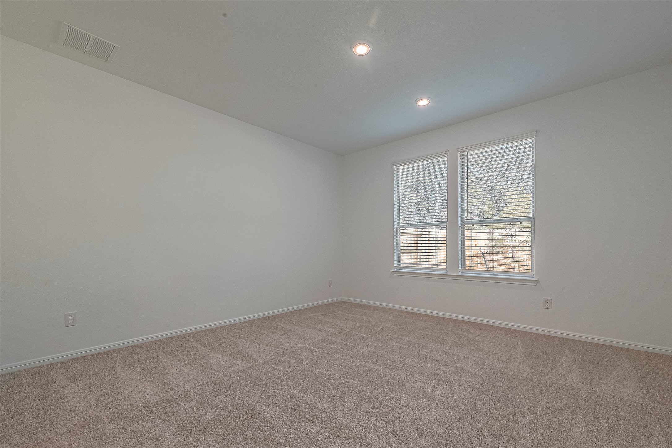 325 Maple Bark Trail Willis, TX 77378 - Photo 10 of 22 an empty room with a window