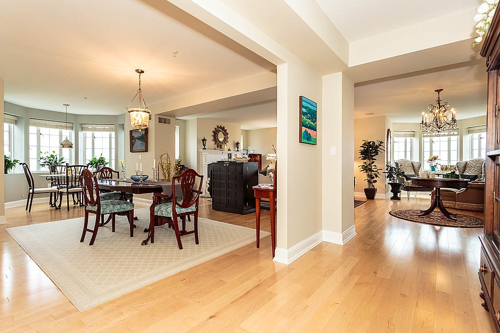 20 Chapel Street, Unit C1001 Brookline, MA 02446 - Photo 7 of 28 a view of a dining room with furniture window and wooden floor