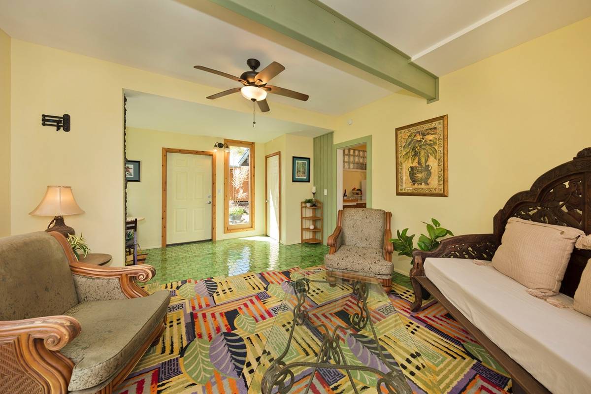 18-3952 Canney Road Mountain View, HI 96771 - Photo 23 of 30 a living room with furniture and a wooden floor