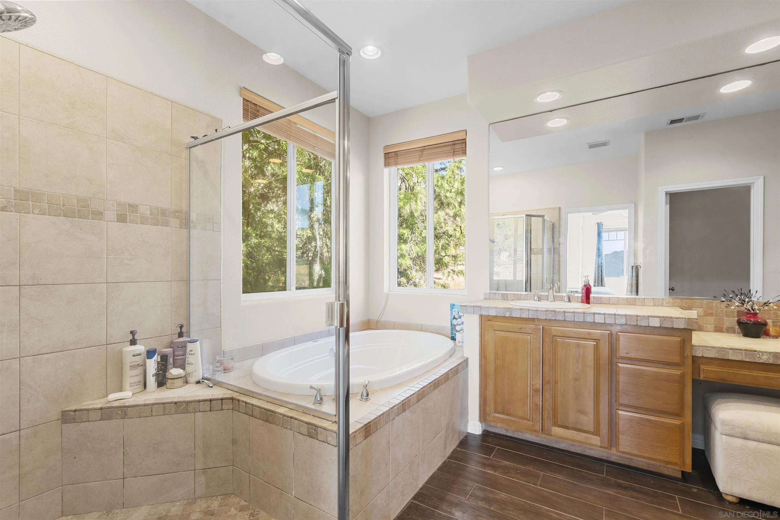 24534 Rutherford Road Ramona, CA 92065 - Photo 13 of 19 a bathroom with a tub sink and mirror