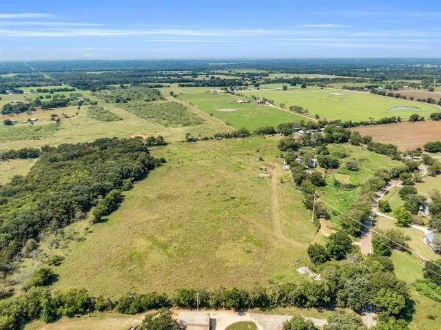 a view of a city with an ocean