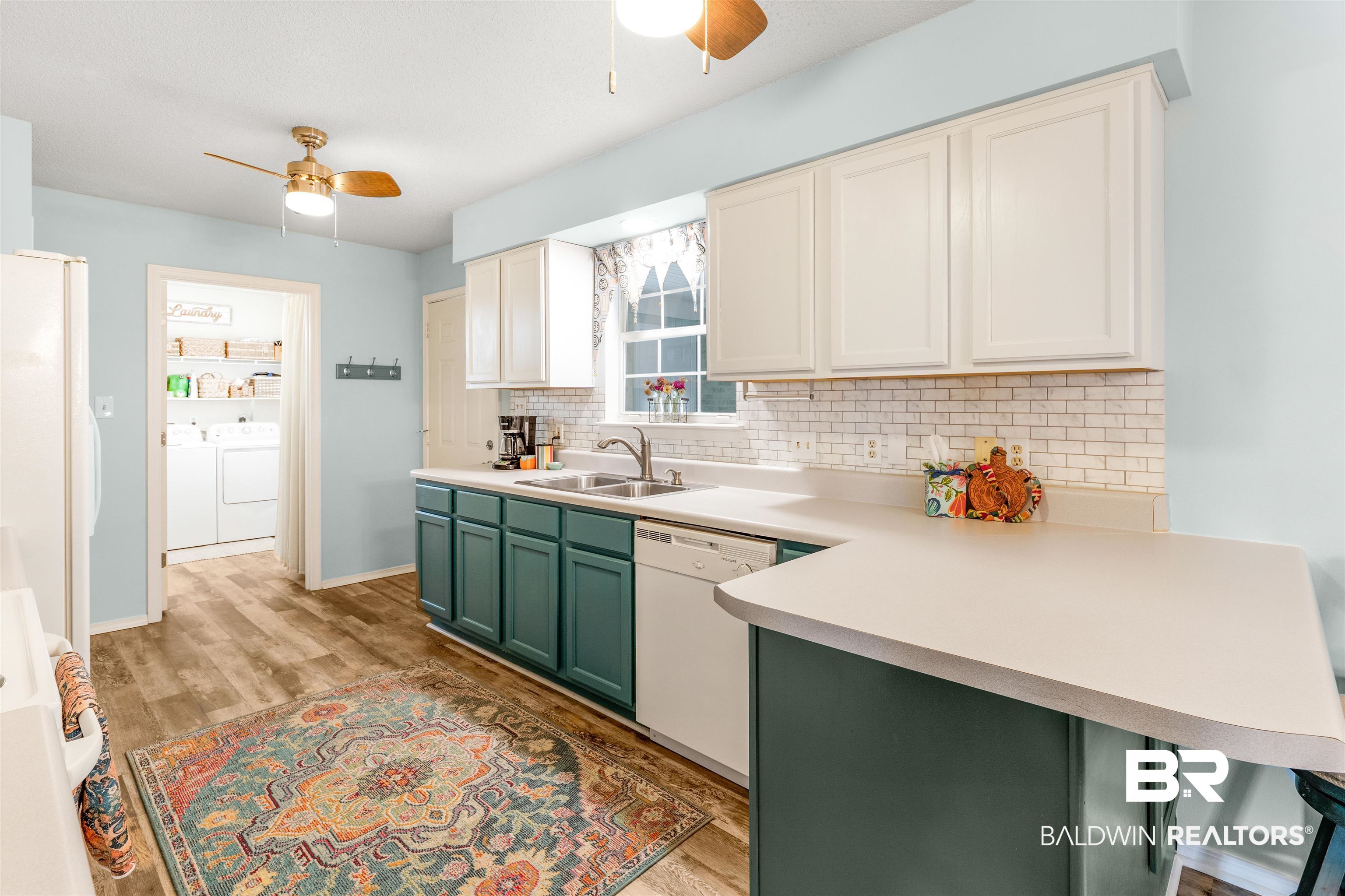 518 Ariel Avenue Foley, AL 36535 - Photo 12 of 47 Kitchen featuring white appliances, backsplash, sink, ceiling fan, and light wood-type flooring