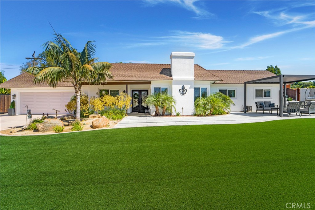 1364 Via Rancho Escondido Ca Escondido, CA 92029 - Photo 1 of 1 a front view of a house with garden