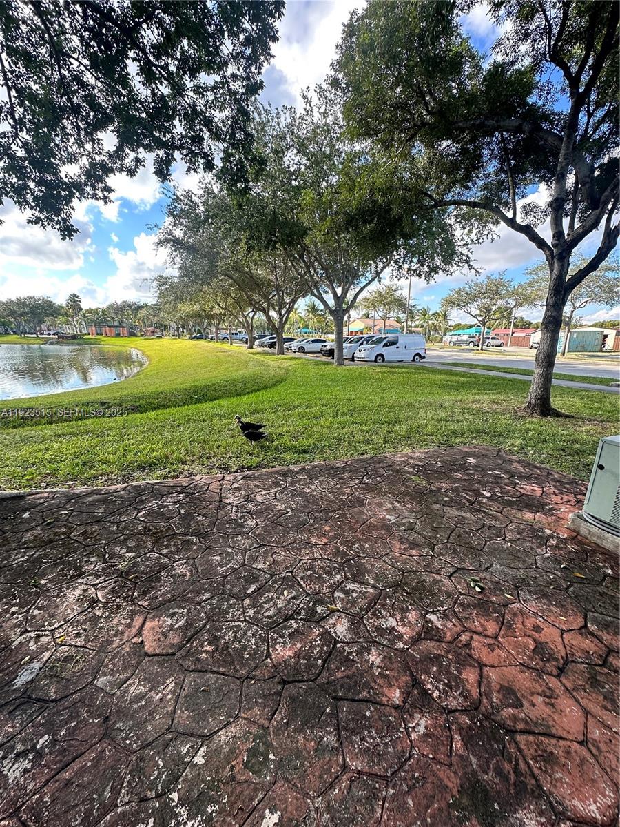 2704 Southeast 15th Place, Unit 152 Homestead, FL 33035 - Photo 13 of 35 a view of outdoor space with green space