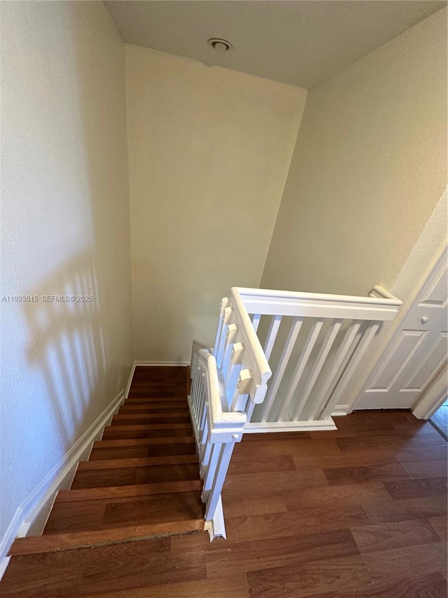 2704 Southeast 15th Place, Unit 152 Homestead, FL 33035 - Photo 17 of 35 a view of entryway with wooden floor
