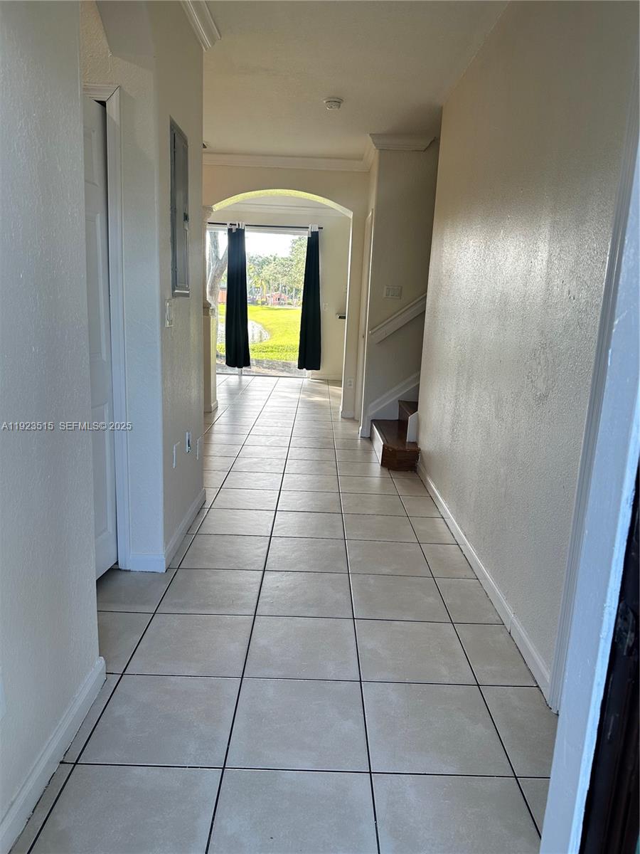 2704 Southeast 15th Place, Unit 152 Homestead, FL 33035 - Photo 3 of 35 a view of an entryway of a house