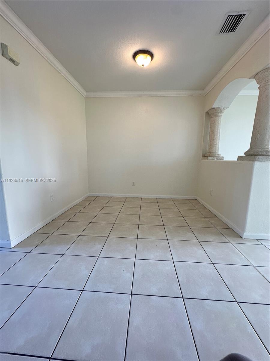 2704 Southeast 15th Place, Unit 152 Homestead, FL 33035 - Photo 6 of 35 a view of a room with an empty space and a window