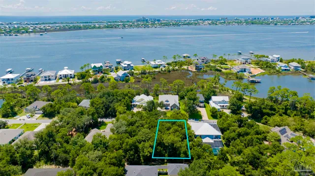 a view of a lake with a house