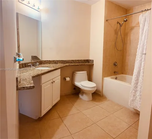 a view of a city with tall buildings