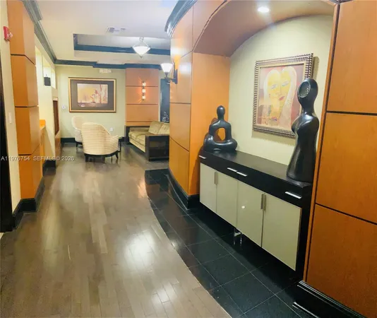 a room with gym equipment and large mirror