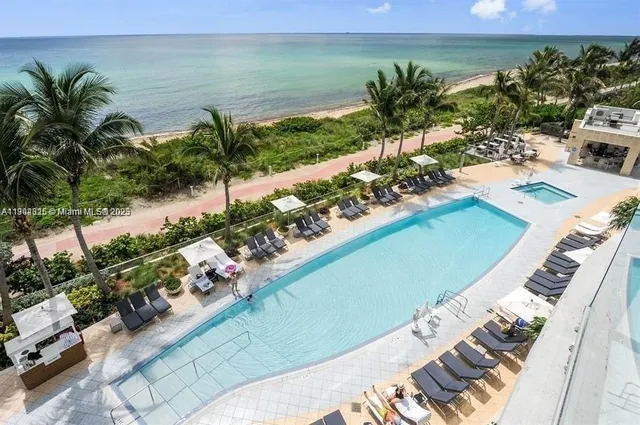 a view of a yard with an outdoor seating
