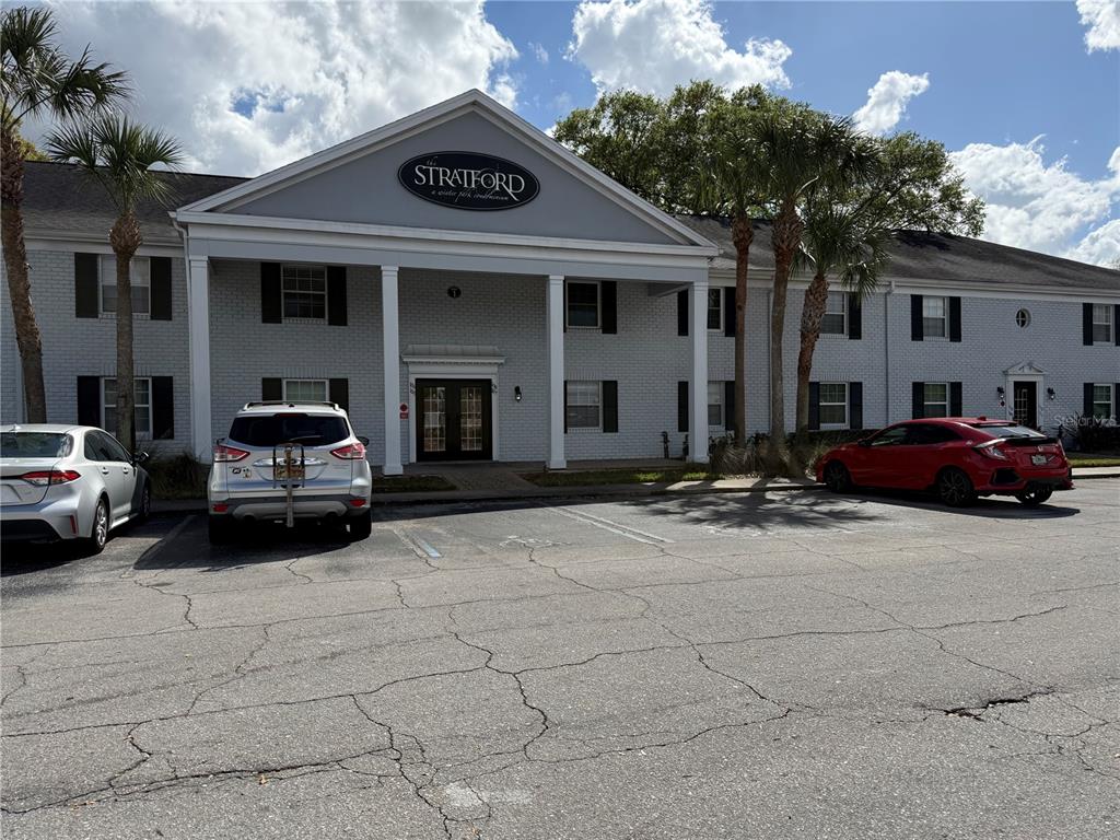 102 Lewfield Circle, Unit 102 Winter Park, FL 32792 - Photo 1 of 1 a car parked in front of a house