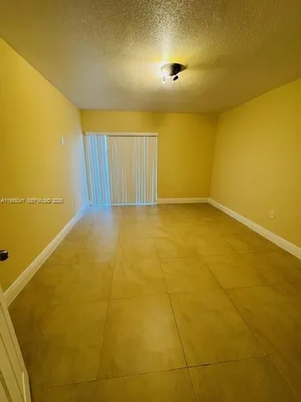 a view of a big room with wooden floor