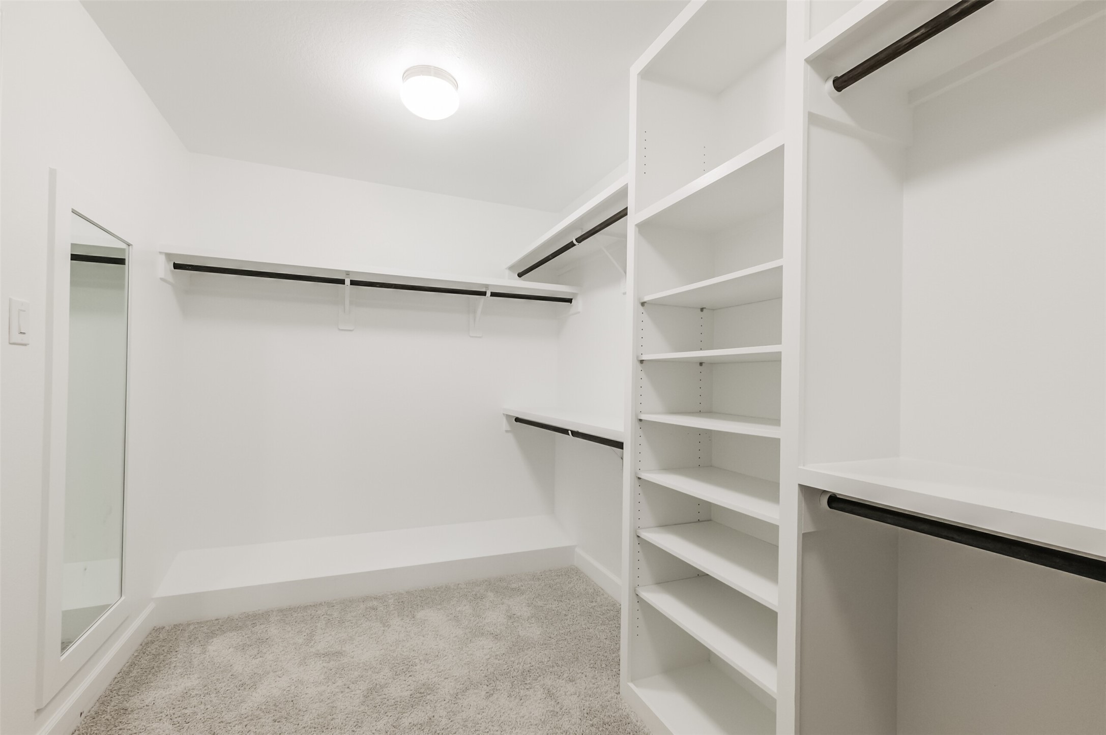 307 Parker Street Houston, TX 77007 - Photo 16 of 25 a view of an empty walk in closet