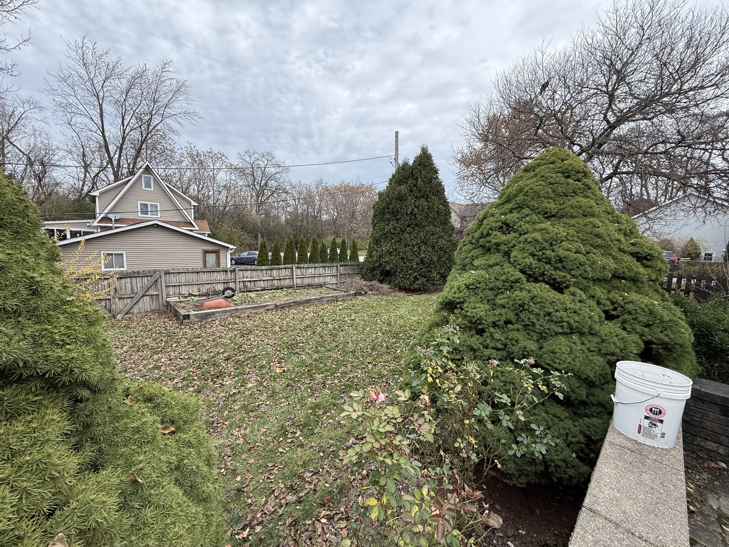 Undisclosed Address Itasca, IL 60143 - Photo 15 of 16 a view of a garden with large trees