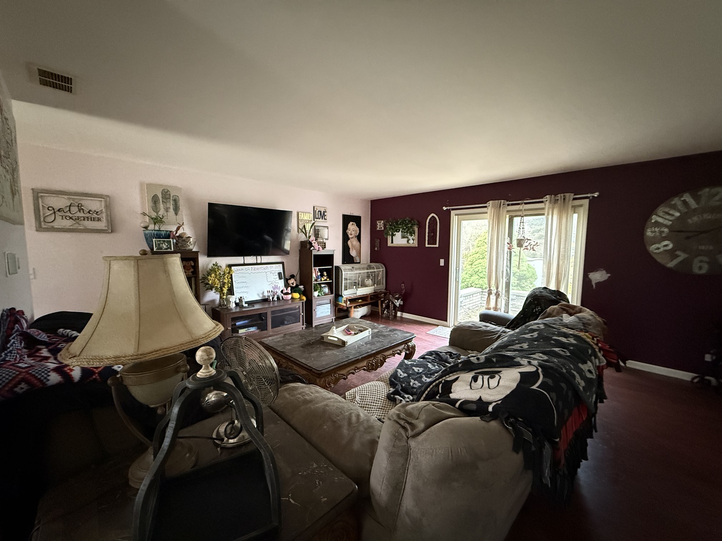 Undisclosed Address Itasca, IL 60143 - Photo 4 of 16 a living room with furniture and a flat screen tv