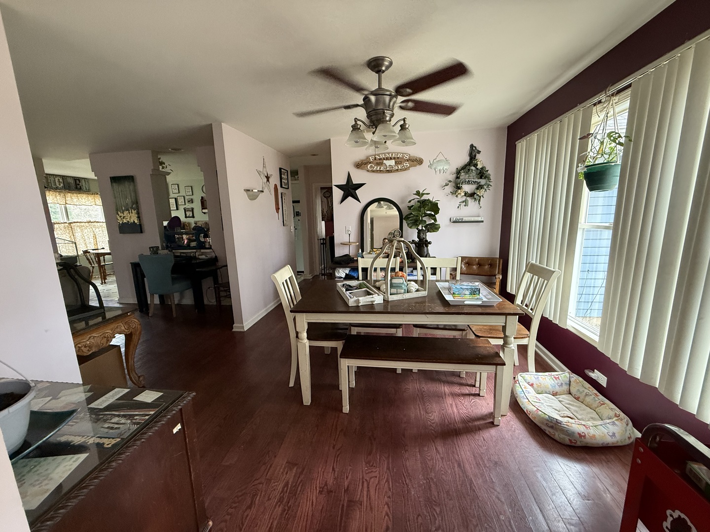 Undisclosed Address Itasca, IL 60143 - Photo 5 of 16 a view of a dining room with furniture window and wooden floor