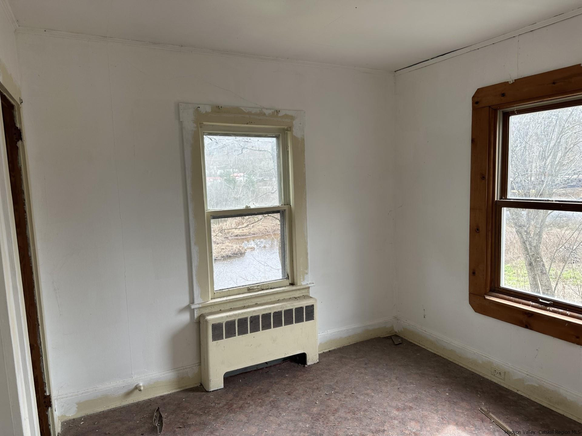 7 Old Rte 52, Unit 13 OLD ROUTE 52 Jeffersonville, NY 12748 - Photo 17 of 26 an empty room with windows