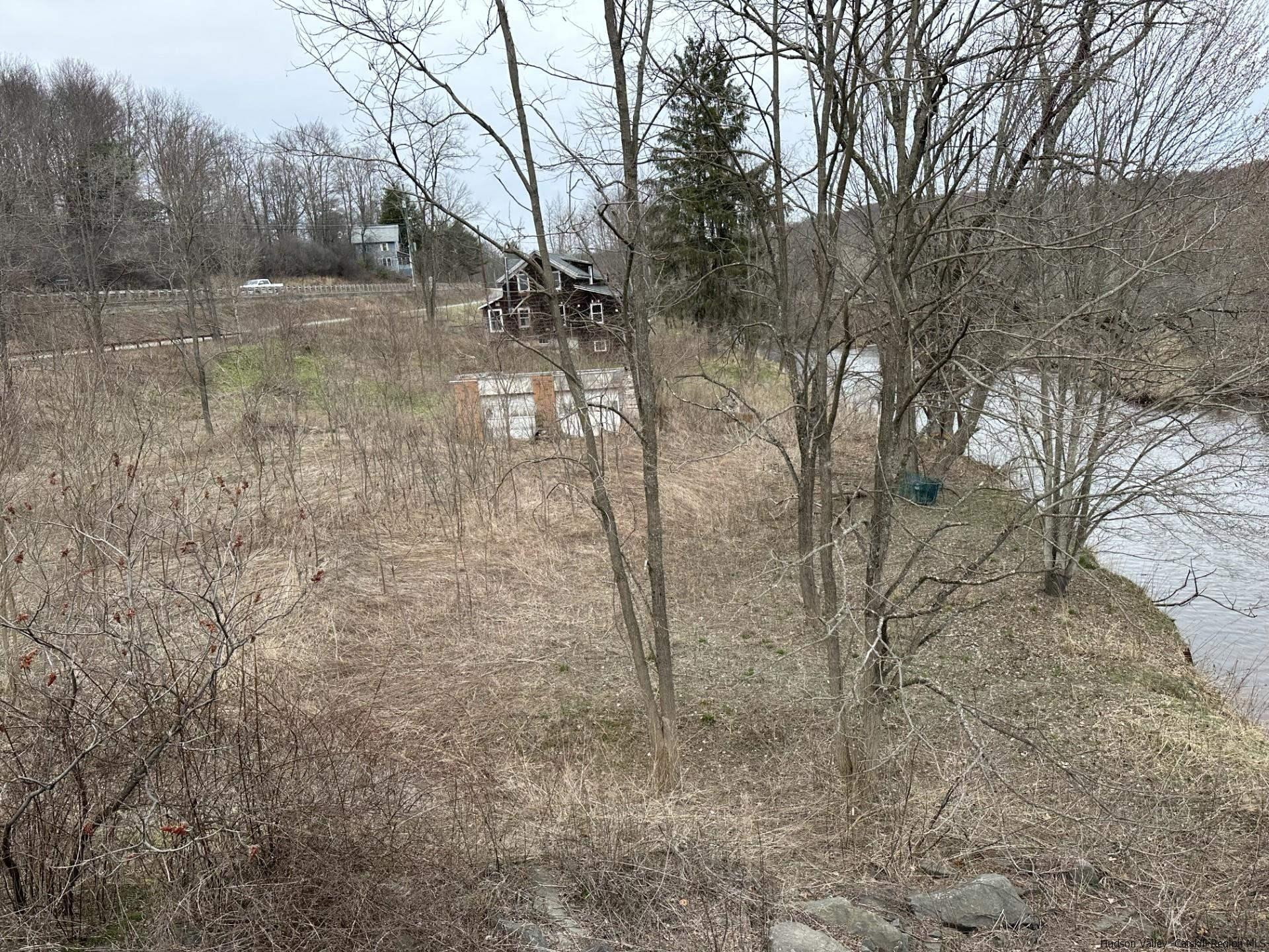 7 Old Rte 52, Unit 13 OLD ROUTE 52 Jeffersonville, NY 12748 - Photo 18 of 26 a view of a yard with trees