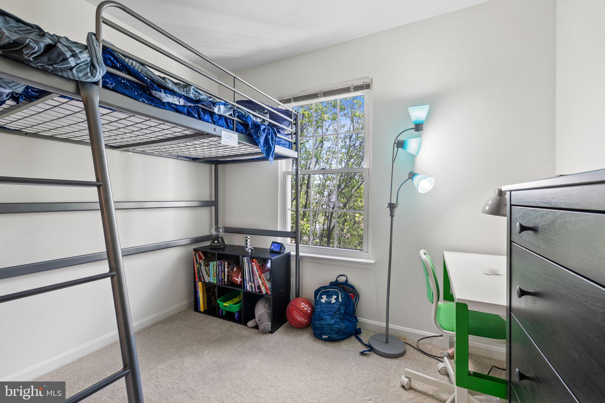 8777 Dunstable Loop Bristow, VA 20136 - Photo 14 of 25 a view of room with window and furniture