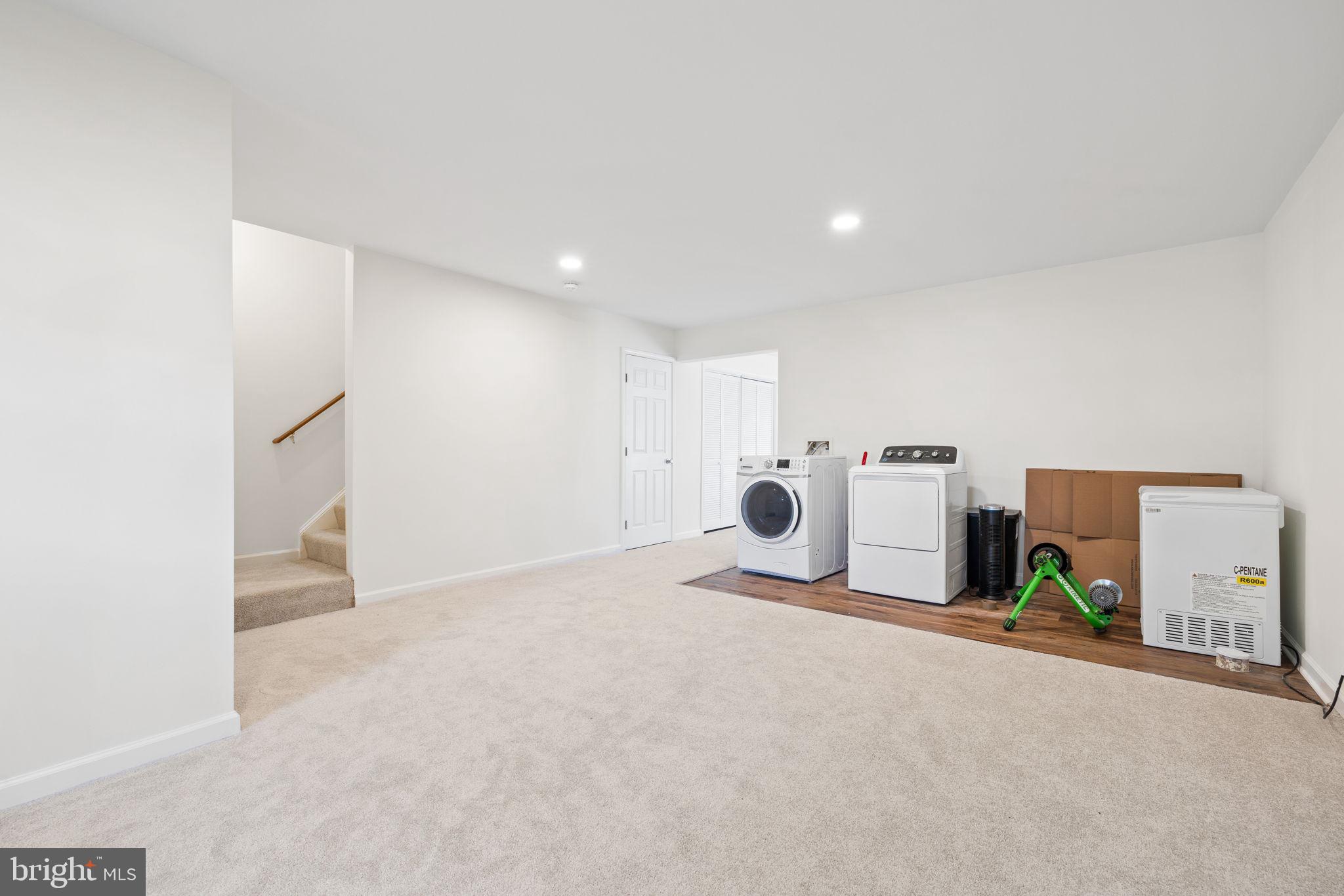 8777 Dunstable Loop Bristow, VA 20136 - Photo 18 of 25 a room with furniture and a flat screen tv
