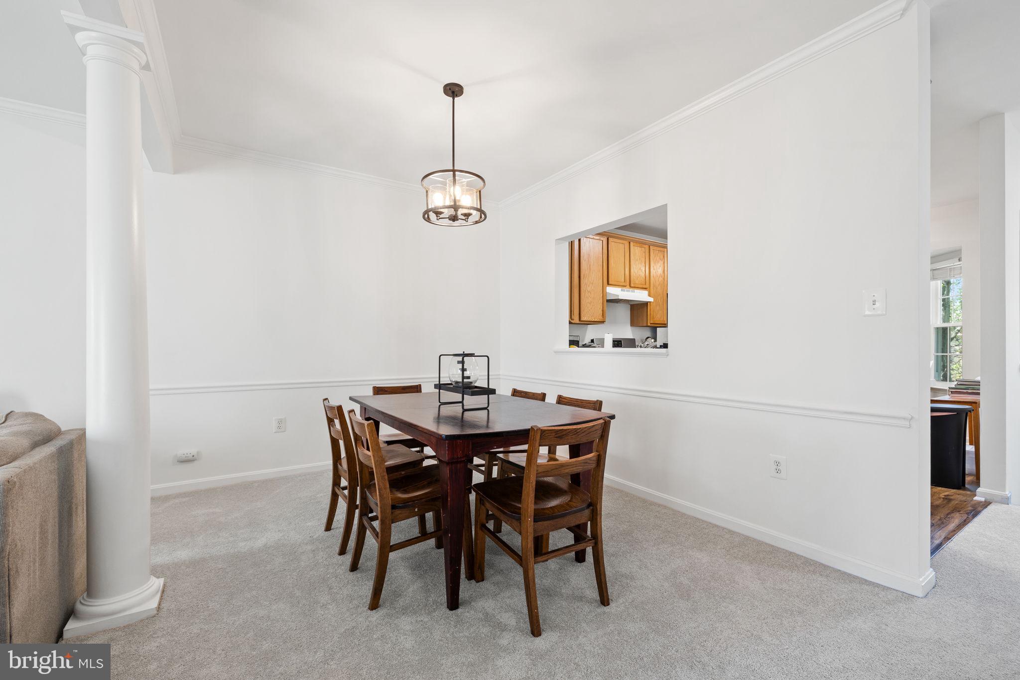 8777 Dunstable Loop Bristow, VA 20136 - Photo 6 of 25 a view of a dining room with furniture