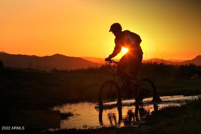 142-x3 East Montello Road Scottsdale, AZ 85262 - Photo 40 of 47 Mountain biker in sunset