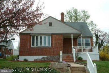 1815 Hanford Road Rosedale, MD 21237 - Photo 1 of 12 front view of a house with a yard