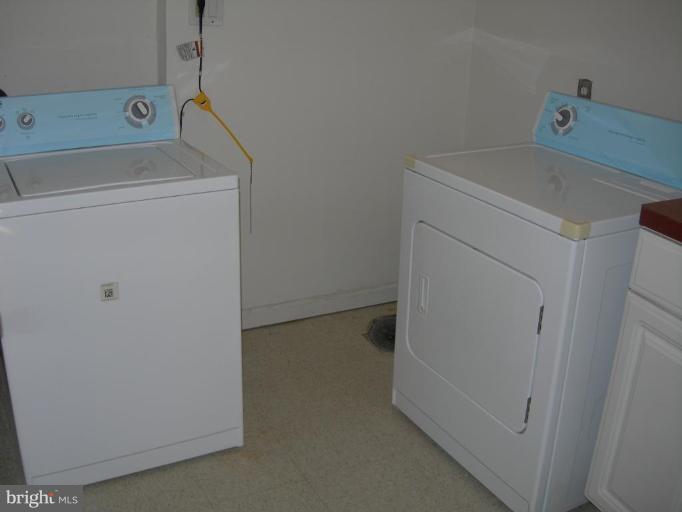 1815 Hanford Road Rosedale, MD 21237 - Photo 11 of 12 a utility room with dryer and washer