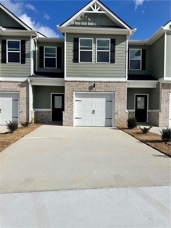 511 Azalea Way, Unit 54 Temple, GA 30179 - Photo 1 of 24 a view of a building with a large space