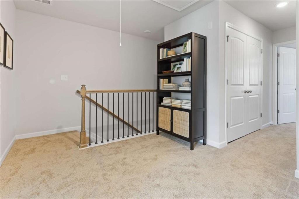 511 Azalea Way, Unit 54 Temple, GA 30179 - Photo 12 of 24 a view of a hallway with closet
