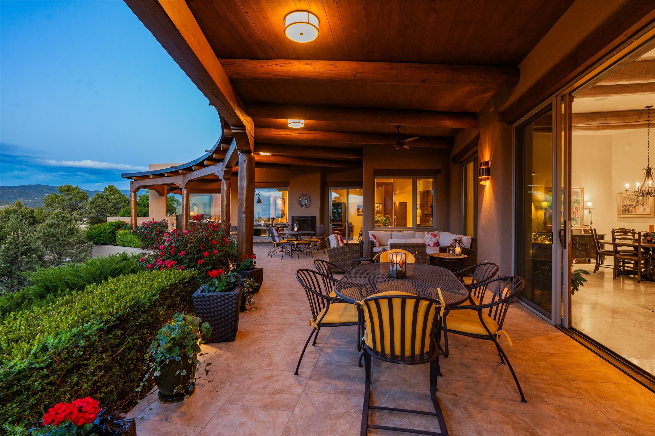 42 San Juan Ranch Road Santa Fe, NM 87506 - Photo 36 of 49 Expansive Portal allows for large groups or intimate gatherings