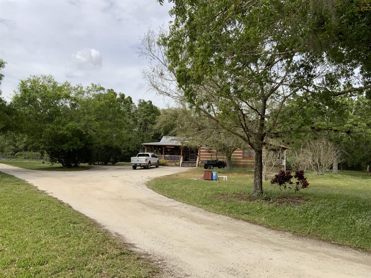 a childrens park with lots of swings and slides