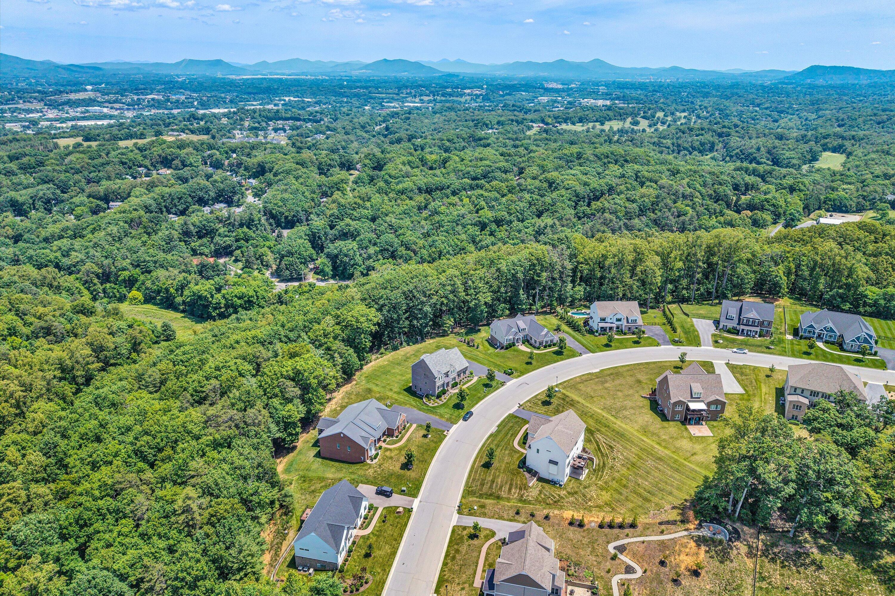 6981 Fairway Ridge Road Salem, VA 24153 - Photo 3 of 53 an aerial view of a house with pool lake view and mountain view