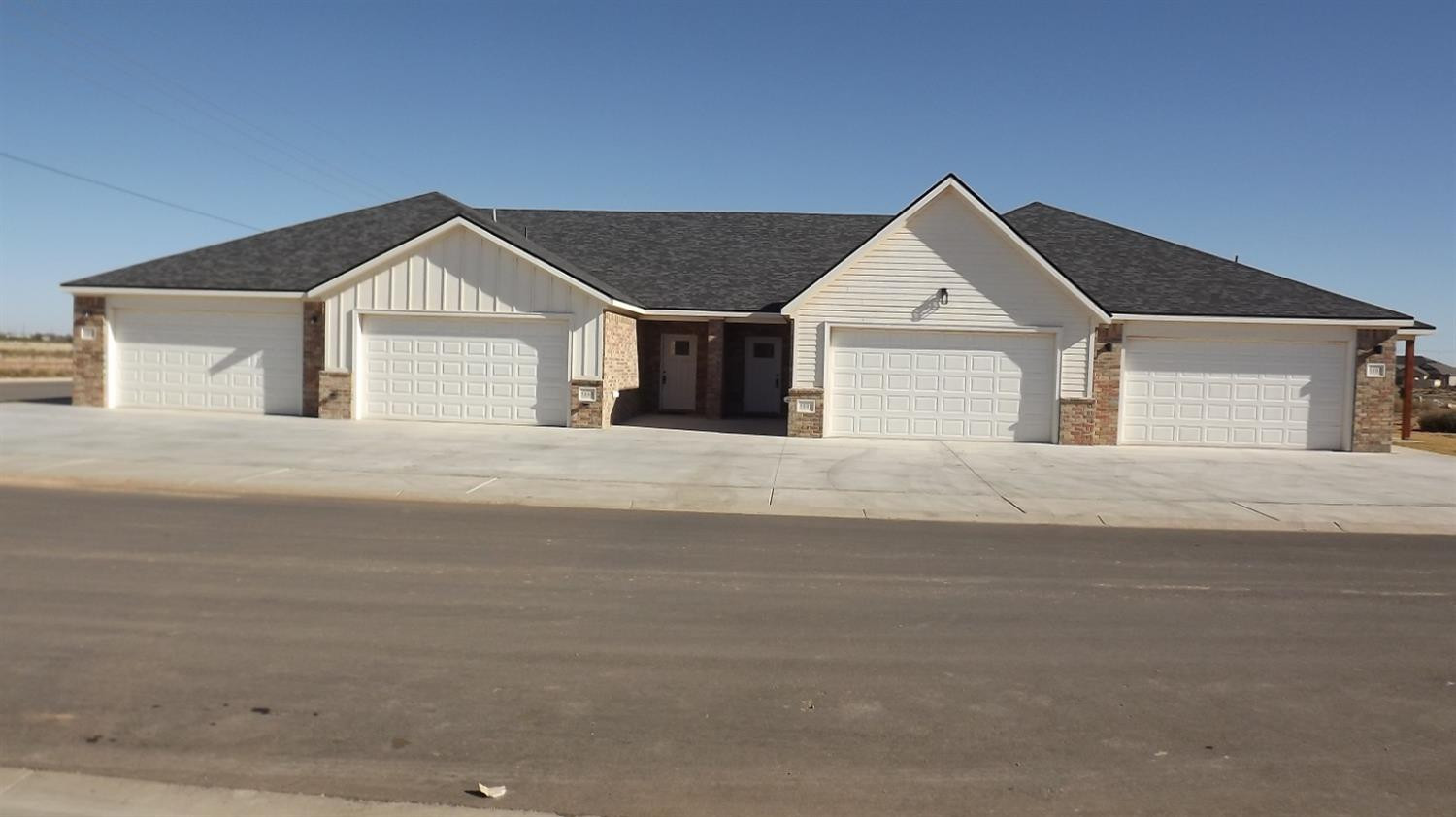 5805 Virginia Avenue Lubbock, TX 79407 - Photo 2 of 9 a view of garage and yard