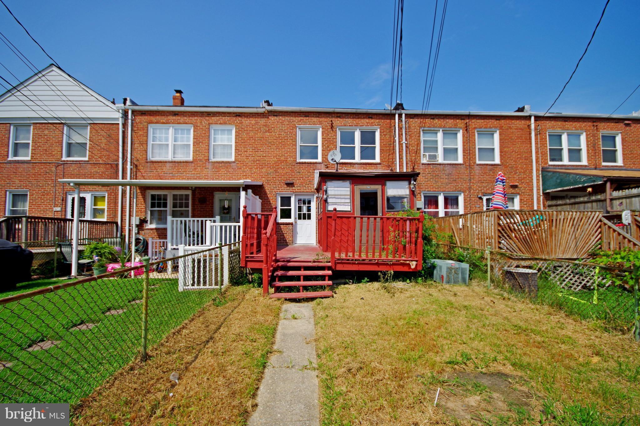 7457 Lawrence Road Dundalk, MD 21222 - Photo 21 of 24 front view of a house with a yard