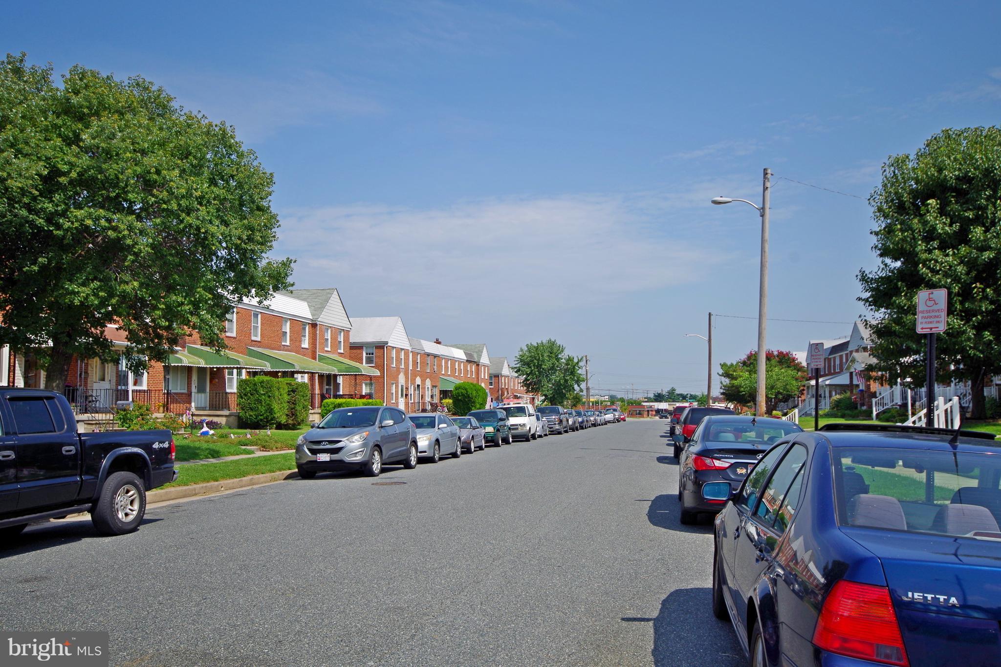 7457 Lawrence Road Dundalk, MD 21222 - Photo 23 of 24 a car parked on the side of a street