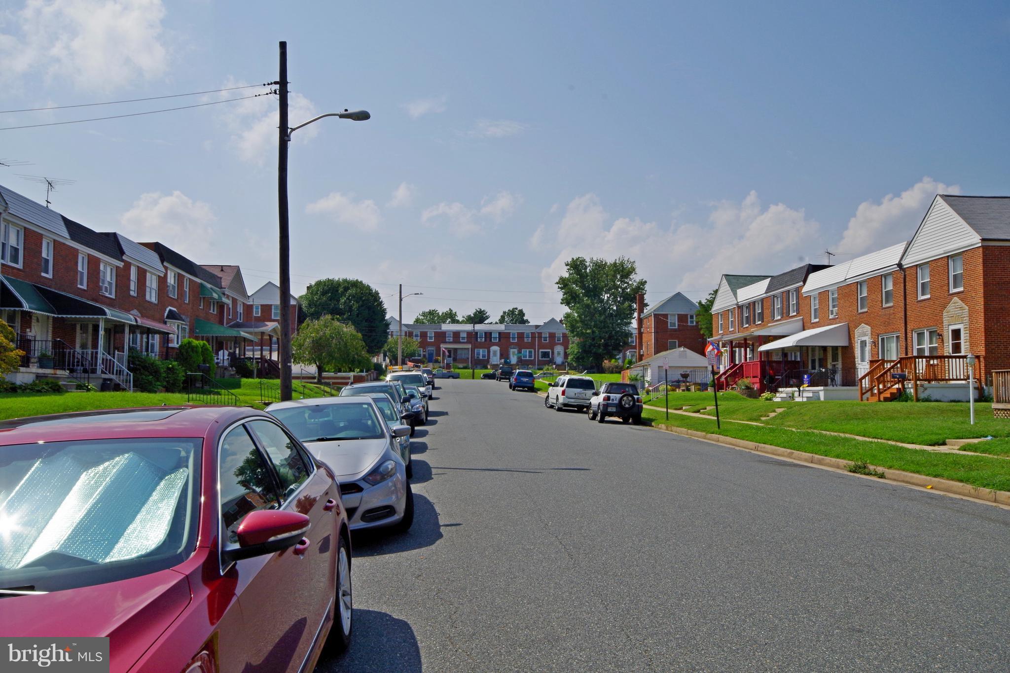 7457 Lawrence Road Dundalk, MD 21222 - Photo 24 of 24 a view of a street with sitting area