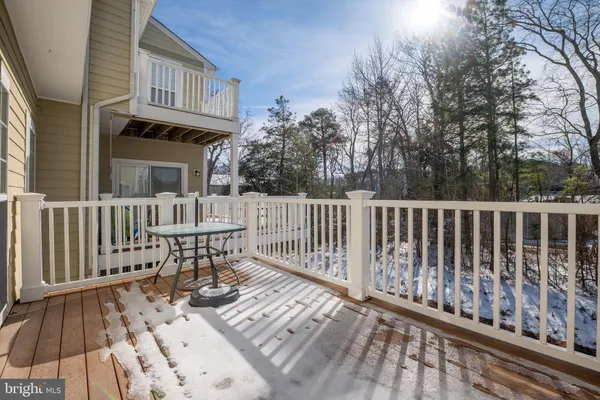 a view of a wooden roof deck