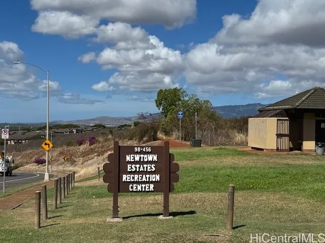 a view of a chairs and table in the back yard