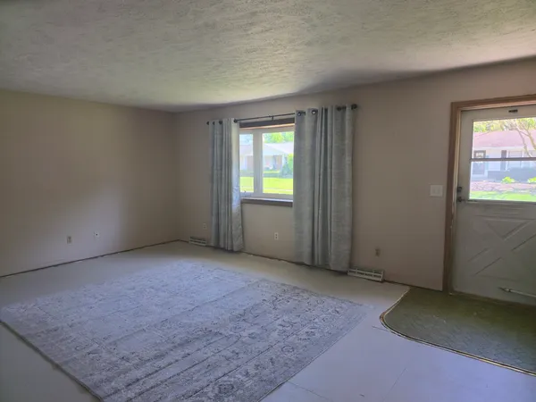 an empty room with windows