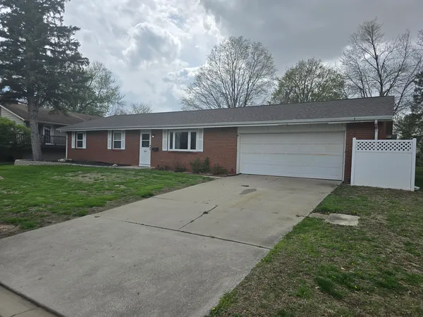 front view of house with a yard