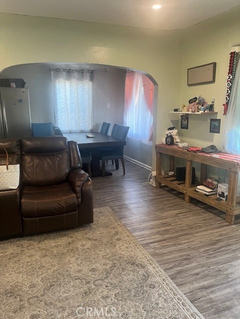 5130 Hedrick Avenue Riverside, CA 92505 - Photo 3 of 9 a living room with furniture and a wooden floor