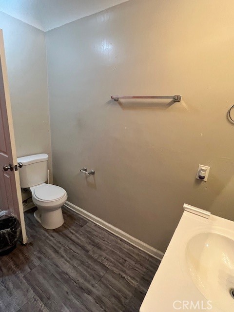 5130 Hedrick Avenue Riverside, CA 92505 - Photo 8 of 9 a bathroom with a toilet and a vanity