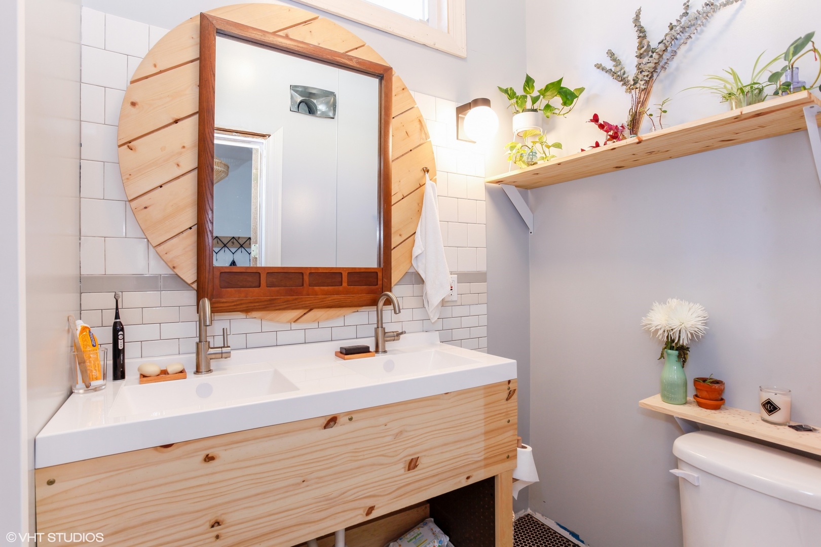 4837 West Irving Park Road, Unit 2 Chicago, IL 60641 - Photo 12 of 24 a bathroom with a sink mirror and vanity