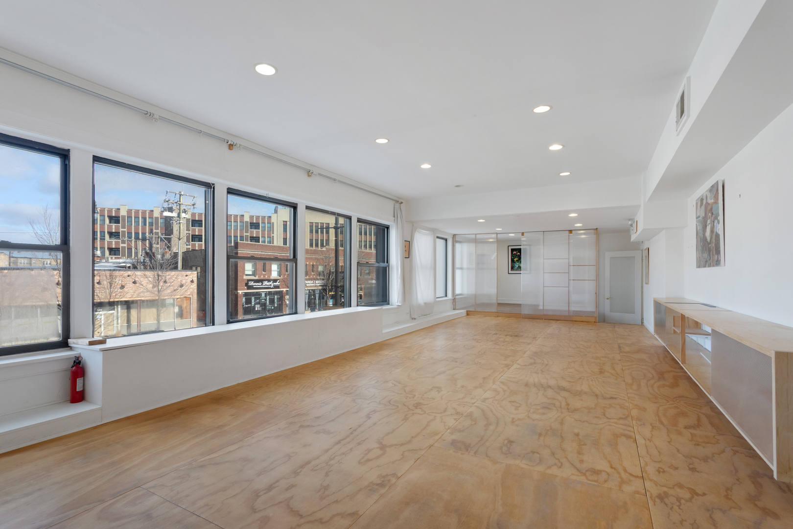 4837 West Irving Park Road, Unit 2 Chicago, IL 60641 - Photo 3 of 24 a view of an empty room with a window